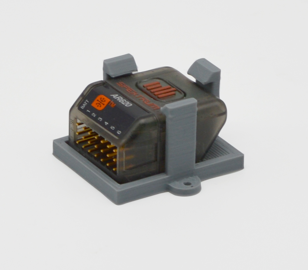 Socle de fixation pour récepteur Spektrum AR620.